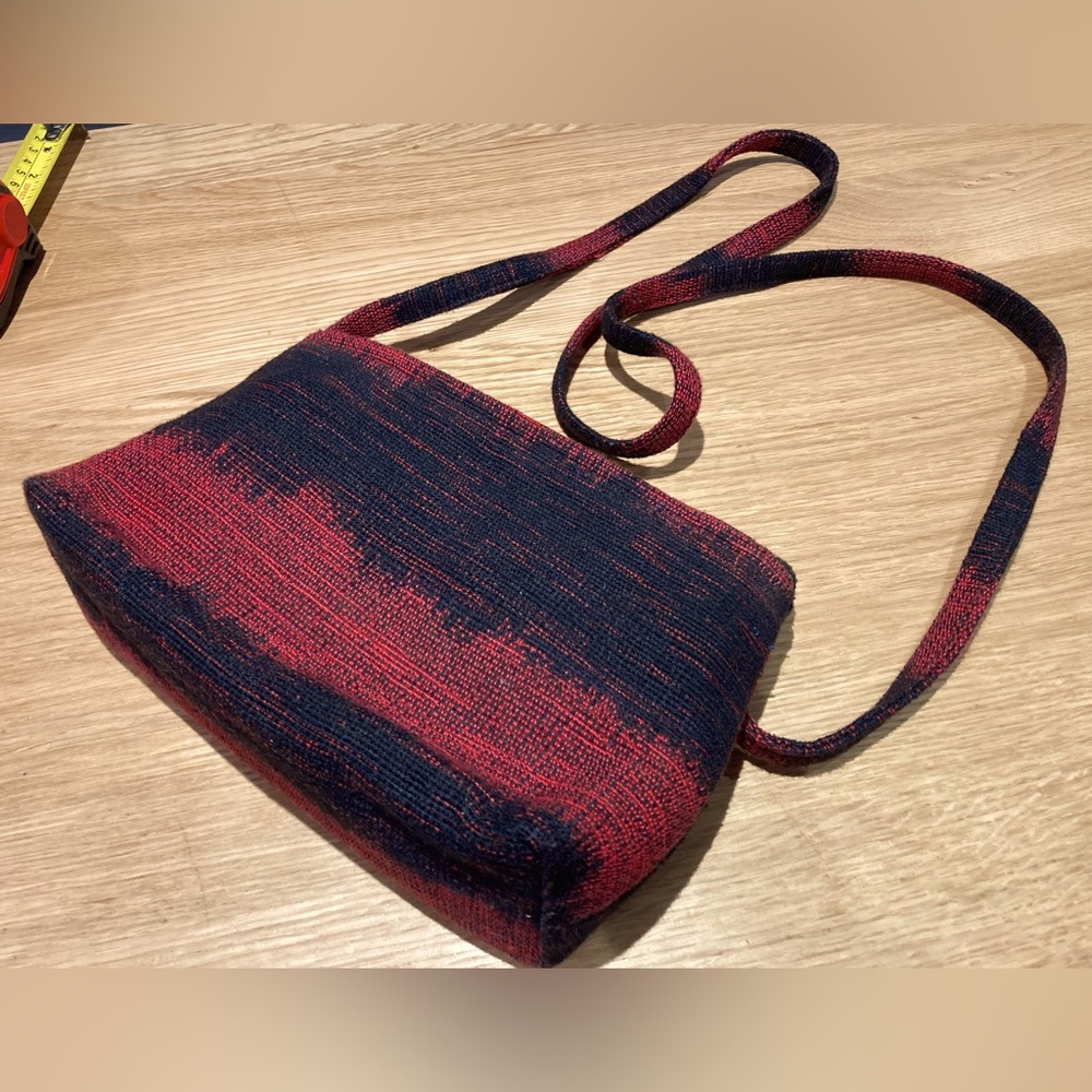 Small body bag by Narda’s. Ikat fabric. Bag for sale, contents not included.